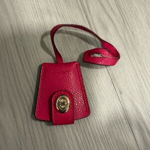 Coach gold and Hot Pink clochette keychain bag charm